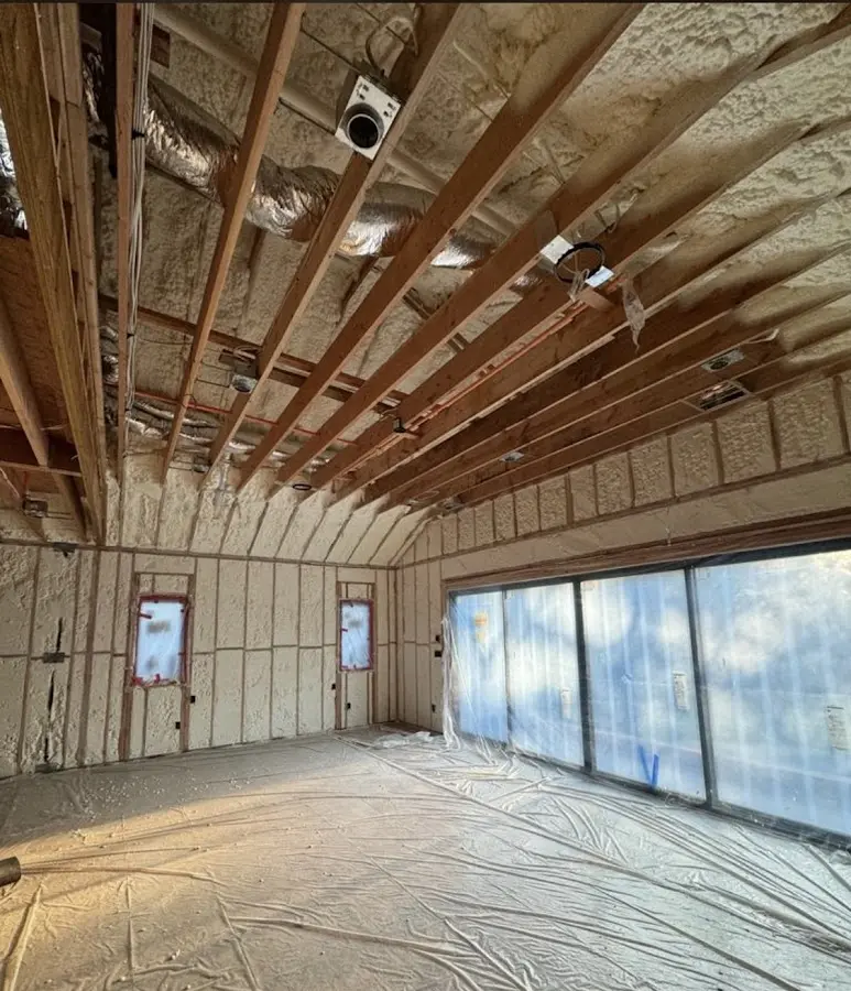 Interior walls and ceiling insulated with spray foam during new construction in Parkland